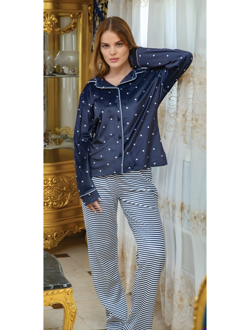 Velvet pyjama with dotted shirt and striped trousers.