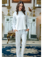 Velvet pyjama with striped shirt & trousers.