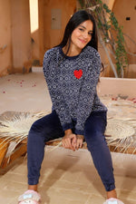 Navy blue velvet pyjama with red heart.